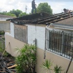 Damaged roof being repaired