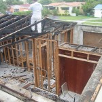 Damaged roof being repaired