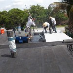 White granulated cap-sheet being applied