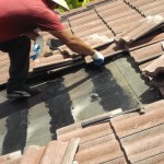 Roof tiles being replaced