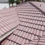 After photo of replaced roof tiles on multi-pitch roof