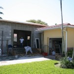 Roof trusses and plywood installed on residential addition