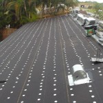 Roof paper and tin cap installation
