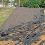 Old shingle removal to reveal decking underneath