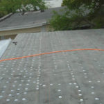 Tin-cap and roofing paper installation