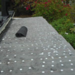 Tin-cap and roofing paper installation