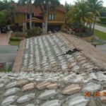 Removal of double roll cement tile roof