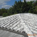Before photo of old tile roof