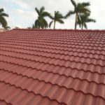 Close-up of Red double roll concrete roof tile installed in Hialeah