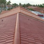 Close-up of Red double roll concrete roof tile installed in Hialeah