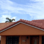 Red double roll concrete roof tile installed in Hialeah